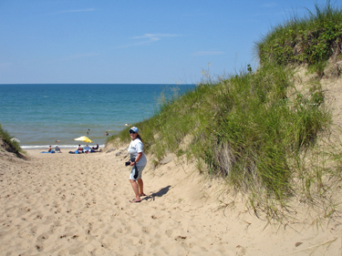 Karen Duquette on the path from the dune to Lake Michigan
