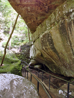 stairs and giant boulder by Cumberland Falls