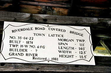 sign with details about Riverdale Road Covered Bridge
