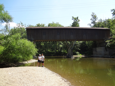 Karen and Alex beneath the Creek Road Covered Bridge