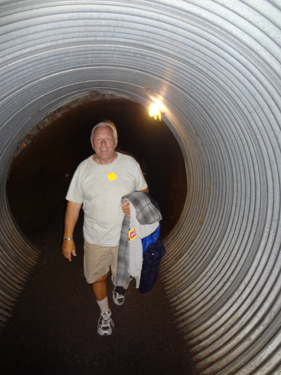 Lee Duquette in a tunnel at Lockport Cave