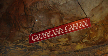 Cactus and Candle sign at Ruby Falls