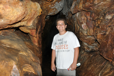 the grandson of the two RV Gypsies entering Fairyland Caverns at Rock Cit