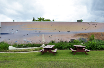 Reflections of Whitewater Lake mural in Boisevain