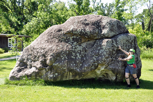 Karen Duquette and the big rock at J.C. Hormel Nature Center in Minnesota