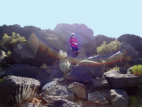 Karen Duquette on the rocks at Boca Negra Canyon