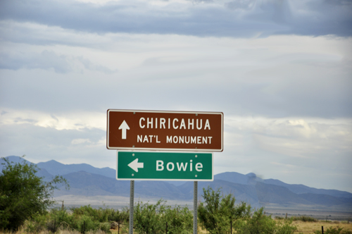 sign: Chiricahua National Monumnet straight ahead