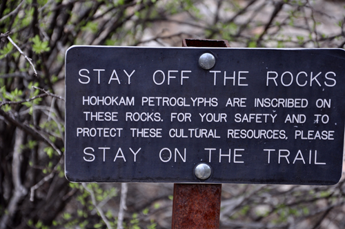 sign: stay off the rocks and on the trail