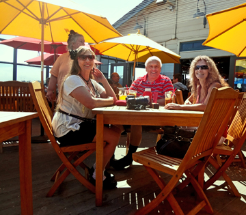 The two RV Gypsies and Ilse having lunch on the pier