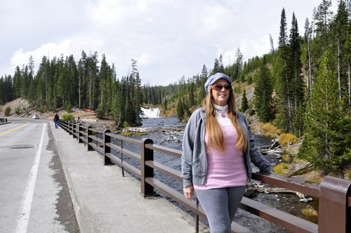 Karen Duquette by Lewis Falls at Yellowstone National Park