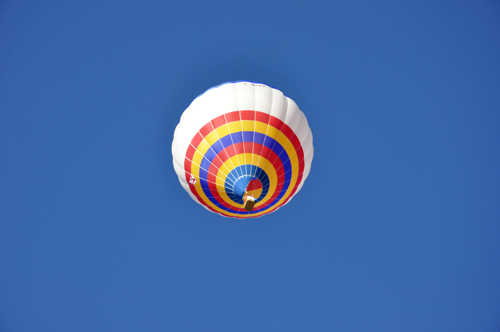 a hot air balloon directly overhead