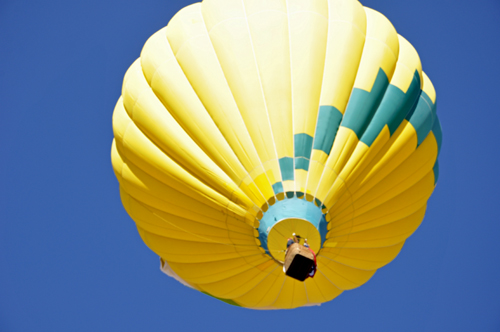 a hot air balloon directly overhead