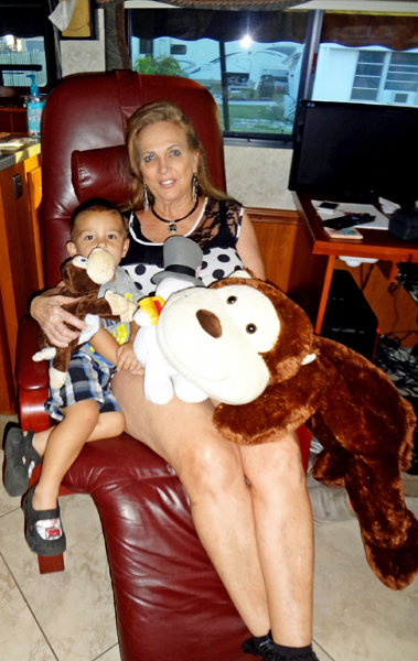 Karen Duquette, her great-grandson, and Cowboy