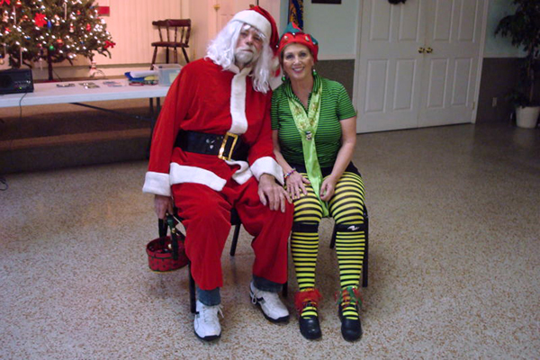 Santa Claus and Karen Duquette the elf