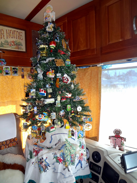 Christmas tree with travel ornaments