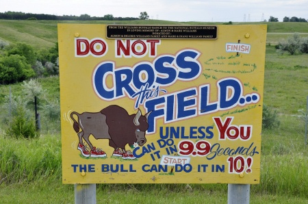 sign warning people how fast a buffalo can run