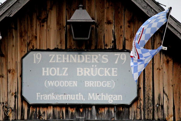 sign: Zehnder's Holz wooden bridge in Frankenmuth, Michigan