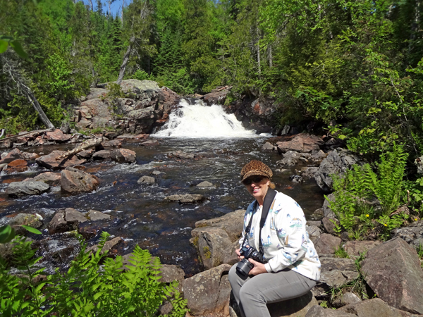 Karen Duquette relaxes at Rainbow Falls