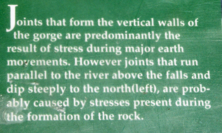 sign about the vertical walls of the gorge