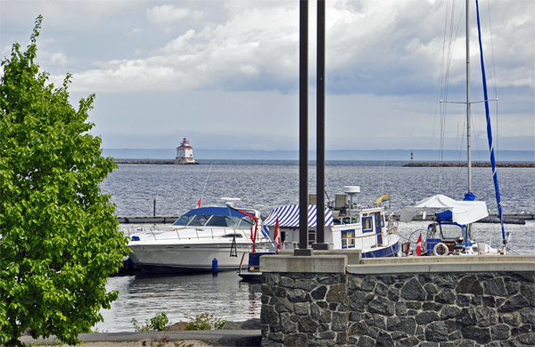 boats, Lake Superior, and a lighthouse