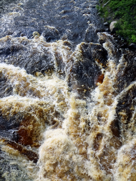 raging  swirling water of the Temperance River