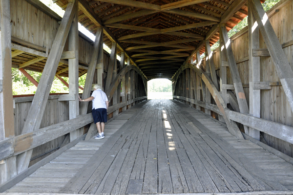 The two RV Gypsies walk through the Neet Covered Bridge 