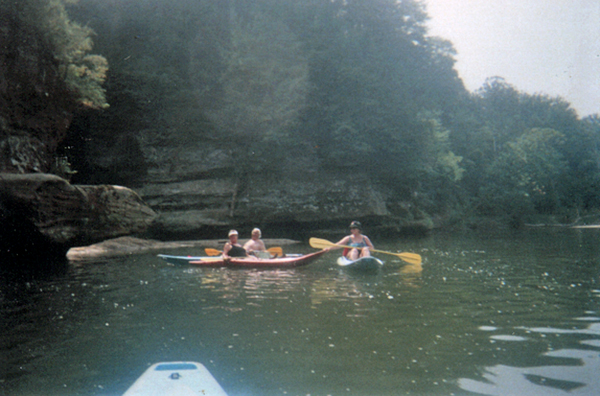 three amigos in kayaks