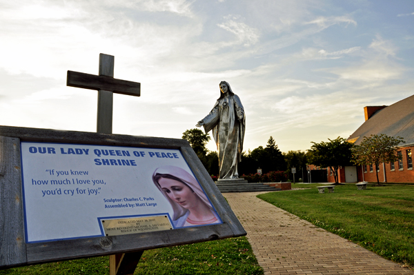 Our Lady Queen of Peace Shrine sign and statue