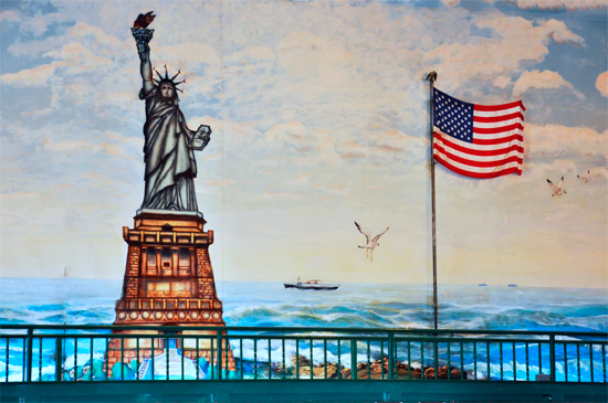 the Statue of Liberty and the USA flag.