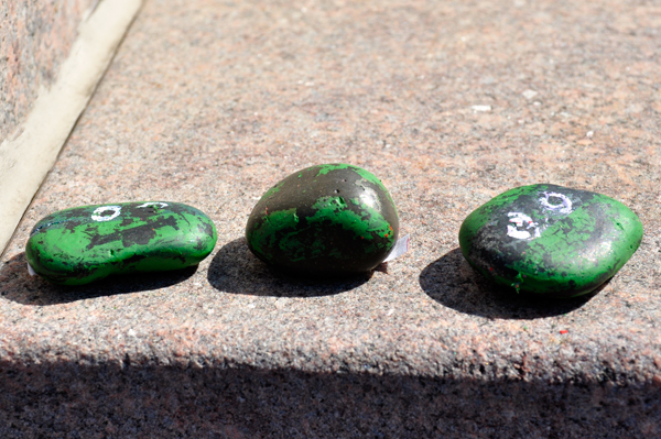 3 green eyed painted rocks