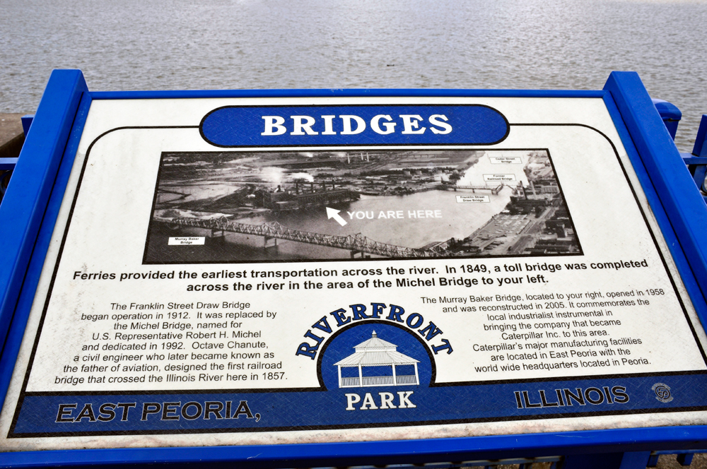 sign about the two Peoria bridges