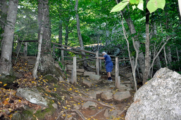 Lee Duquette going up stone stairs
