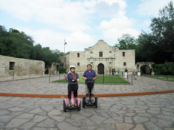 The two RV Gypsies on Segways in front of the Alamo