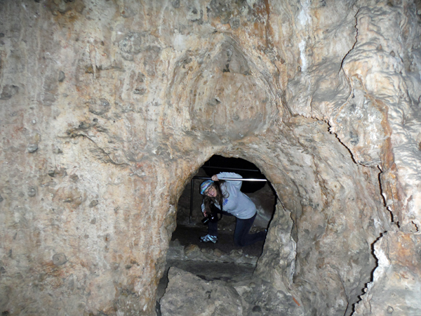 Karen Duquette peeping through the tunnel