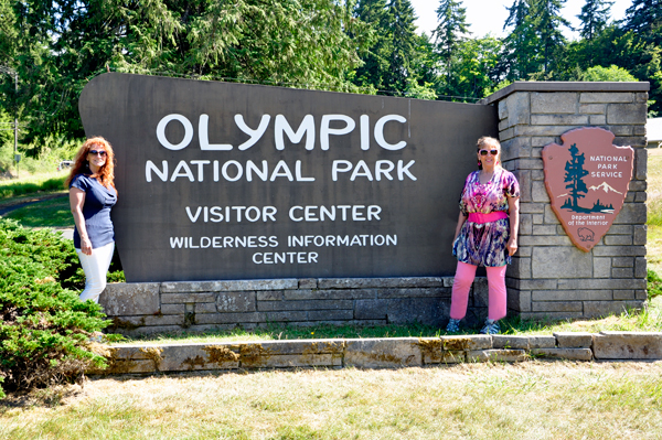 Karen and Ilse at the Olympic National Park Visitor Center sign