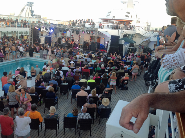 the crowd at a pool deck concert