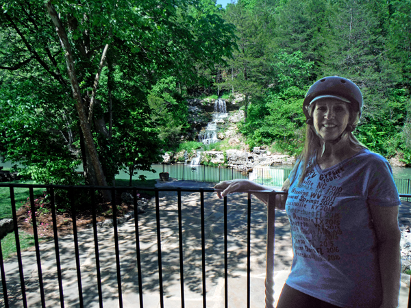Karen Duquette and the waterfall behind the Wilderness Chapel