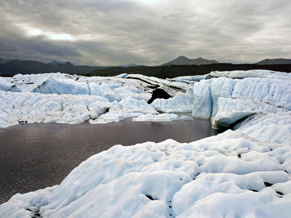 big sheet of ice at Matanuska Glacier and a flowing river