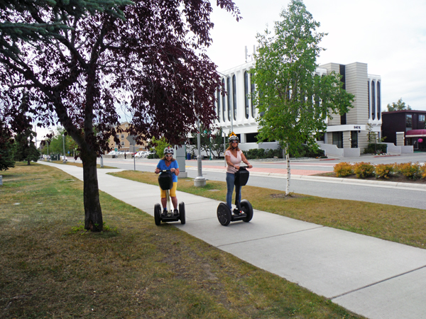 Karen Duquette passing Ilse Blahak on  Segways