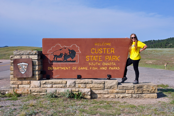 Karen Duquette at Custer State Park entrance