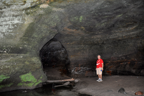 Lee Duquette entering a caves near Cascade Falls