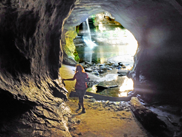 Karen Duquette entering a cave near Cascade Falls