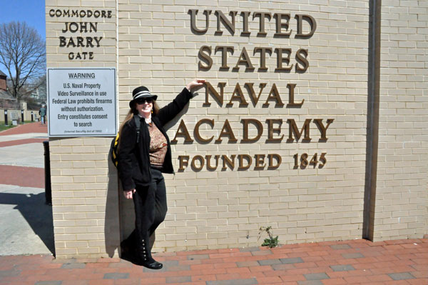 Karen Duquete at entry sign at United States Naval Academy Annapolis