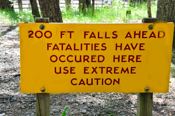 sign 200 foot falls - caution
