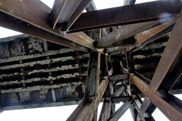 looking up under the railroad trestle