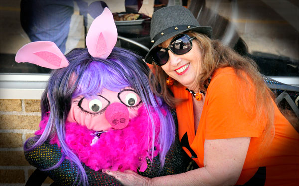 Karen Duquette and the pink piggy scarecrow