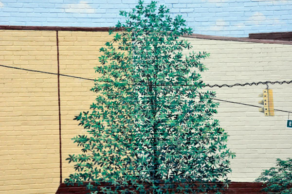 tree and traffic light on the mural