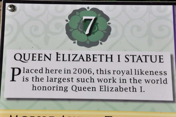 Queen Elizabeth statue sign