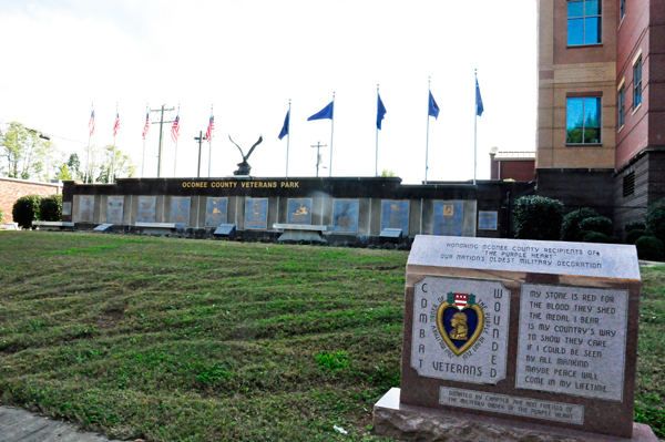 Combat Veterans monument, wall and flage