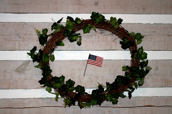 wreath and small USA flag